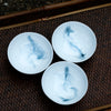 Porcelain Round Teacup with Swirling Clouds Inside