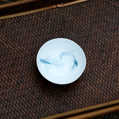 Porcelain Round Teacup with Swirling Clouds Inside