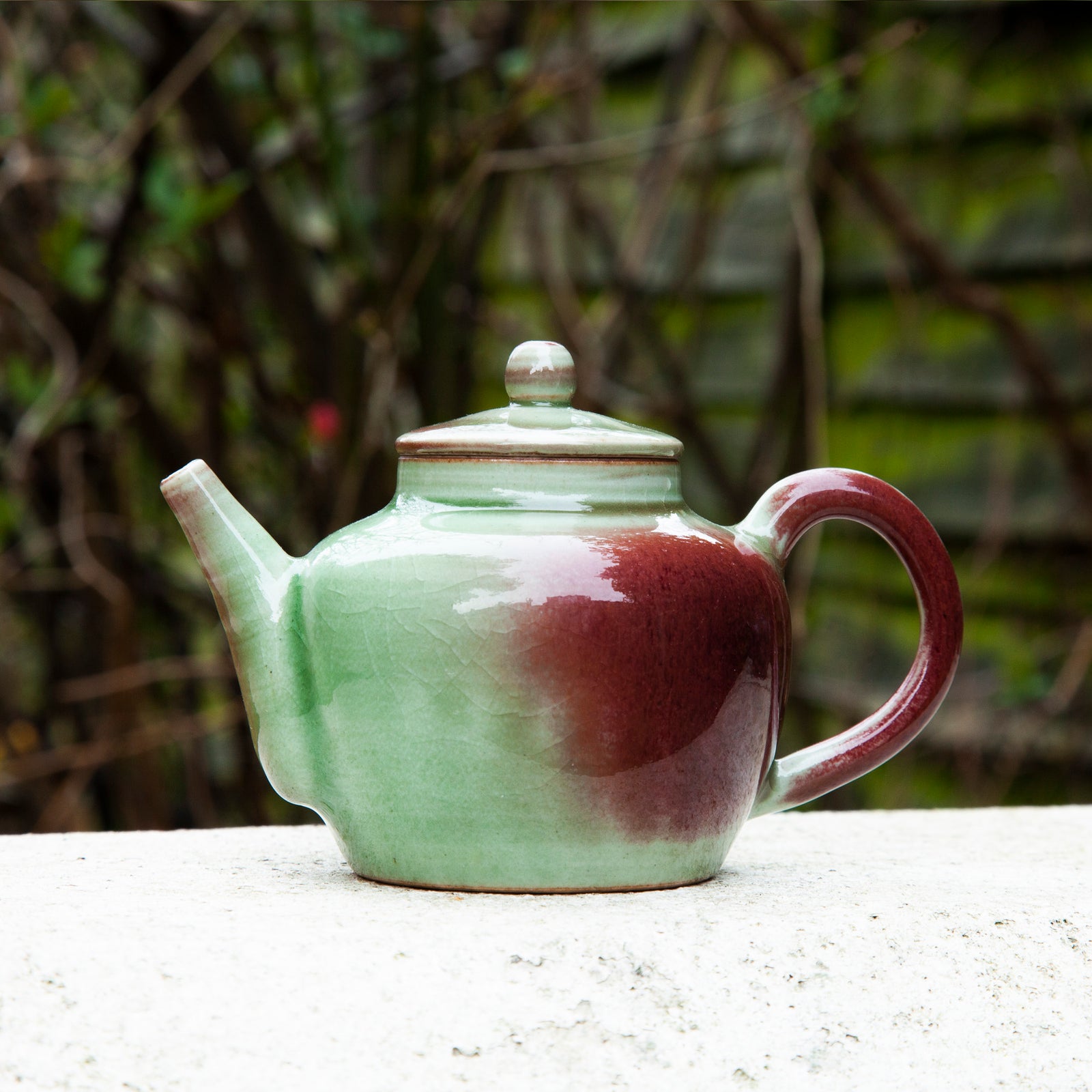 Green Glazed Porcelain Teapot with Red