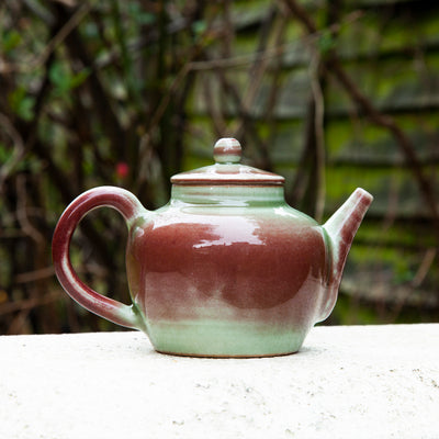 Green Glazed Porcelain Teapot with Red