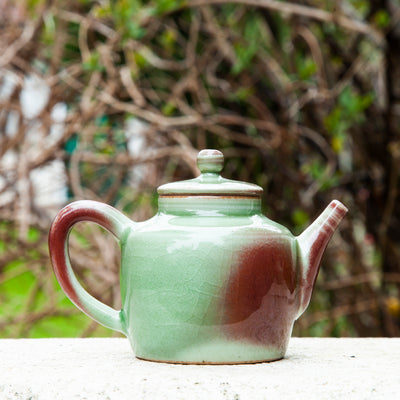 Green Glazed Porcelain Teapot with some red